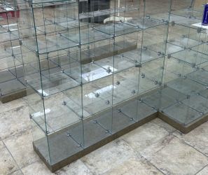 20 Sections of glass cube shelving with base retail