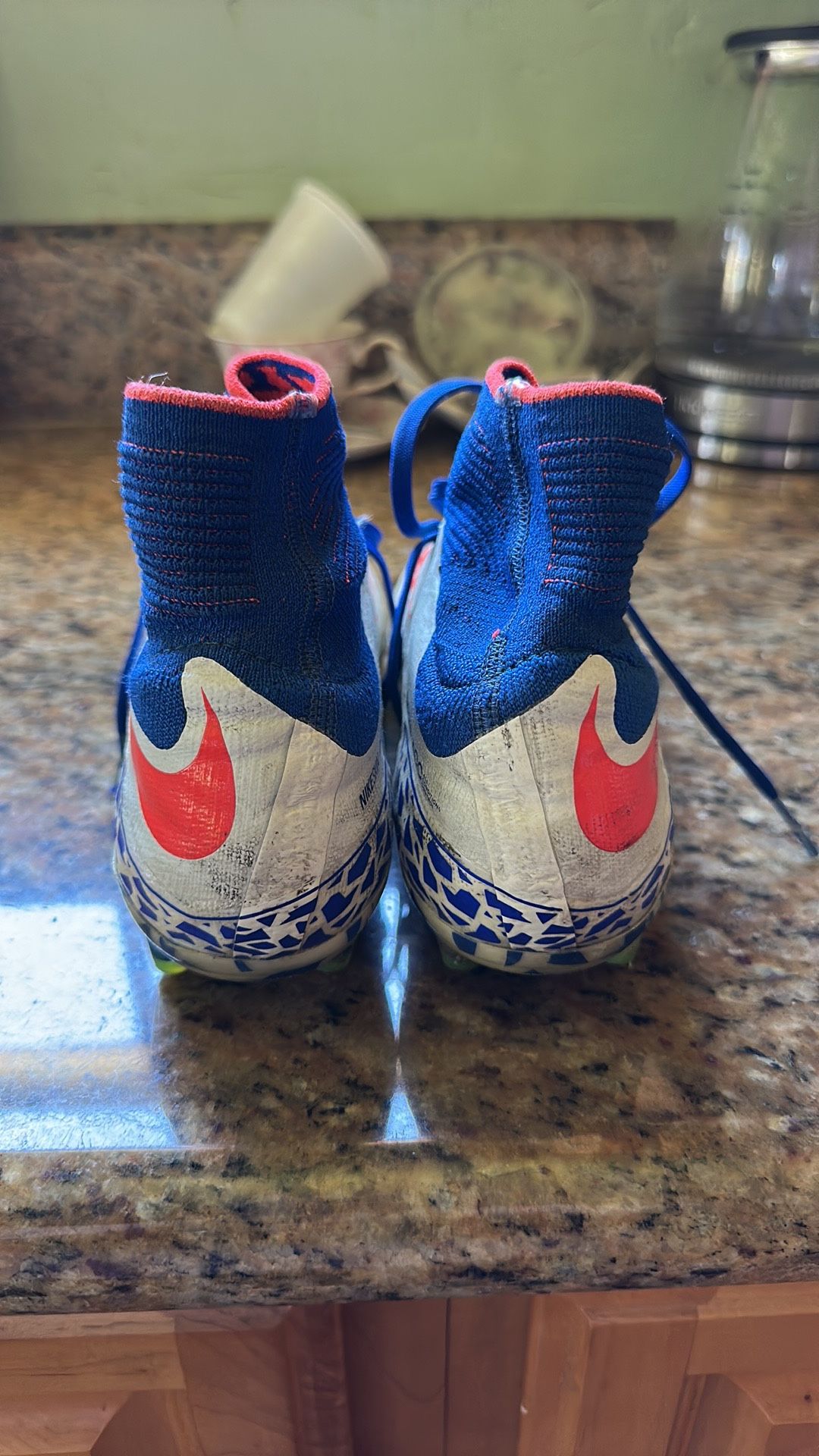 Nike Blue and Red Hypervenom Soccer Cleat with Striking Design