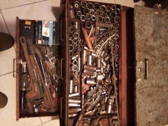 Tool box full of tools lots of Craftsman all kinds of different assortments of tools this thing's loaded down with stuff