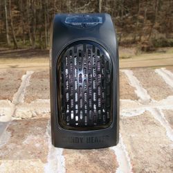 New Handy Heater with adjustable temperature Compact Personal Heater Plugs into Any Outlet 350 Watt Energy-Smart Heating Power Digital Temperature D