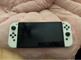 nintendo switch oled model w/white joycons