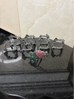 Wanda Scruby set of seven grape vine napkin rings