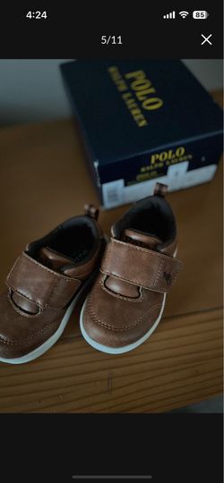 There very cute shoes for Boys the size is 6 The color is Tan Brown it’s made by RALPH LAUREN
