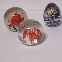 Three paperweights, different styles and sizes, all three for one price.