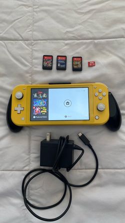 Nintendo Switch Lite with 3 games and memory card