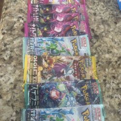 10 Packs Of Pokémon Cards 
