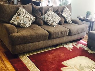 Couch with love seat and rug