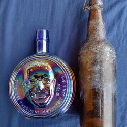 Antique glass bottles and presidential wine bottles
