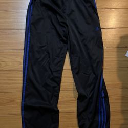 Black adidas sweats with blue strips