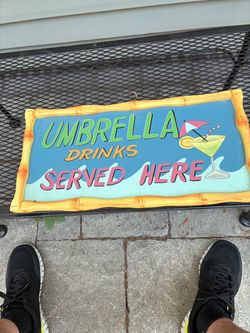 Umbrella drinks sign