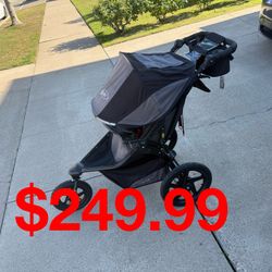 Bob stroller With Snack Tray And Deluxe Handlebar Console with Tire Pump