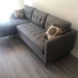 New Reversible Sectional .  Grey.  86” X 59”.  Free Delivery !
