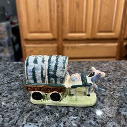 Vintage Ceramic Donkey Pulling Covered Wagon Pair of Salt and Pepper Shakers.  Preowned with original cork stoppers.  Made in Japan stamped on the bot