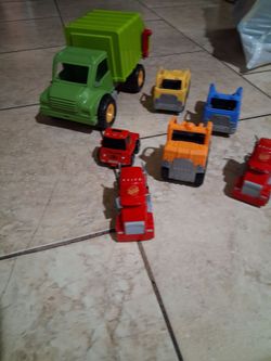 Boy bundle truck toy 2 r lighting McQueen in good condition all for 5