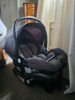 Graco Snugride LX Rear-Facing Infant Car Seat Carrier, Adjustable Headrest & Harness, Canopy