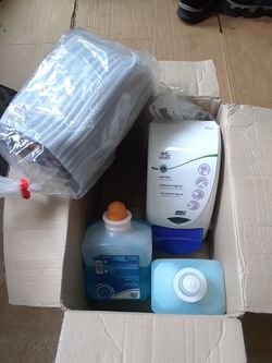 Hand soap dispensers with soap.