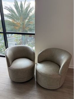 Grey Faux Leather Swivel Barrel Chair