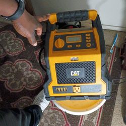 Cat Power Station with 1,200-Peak-Amp Jump Starter, Tire Compressor, and Power Inverter, CJ1000DXT in Yellow
