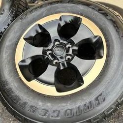 Bronze 18” Jeep Wrangler Dragon Edition Black & Gold Wheels Rims and A/T Tires Rubicon Gladiator P255/70R18 255/70R18 Cherokee 18 Inch