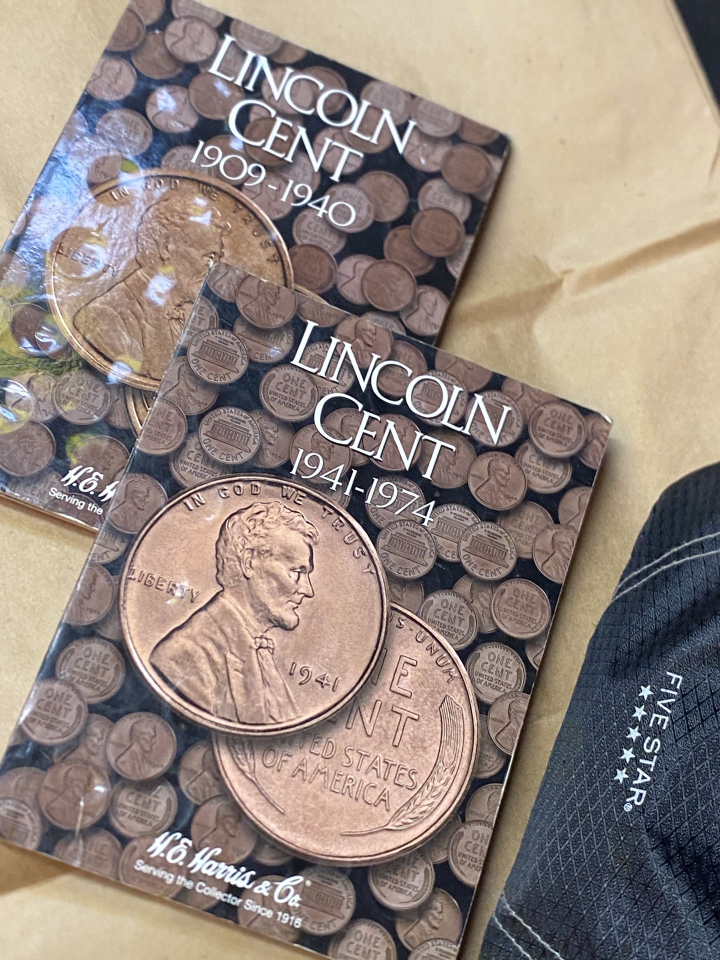 12 Rolls Of Wheat Pennie’s & 2 Lincoln Cent collection Books