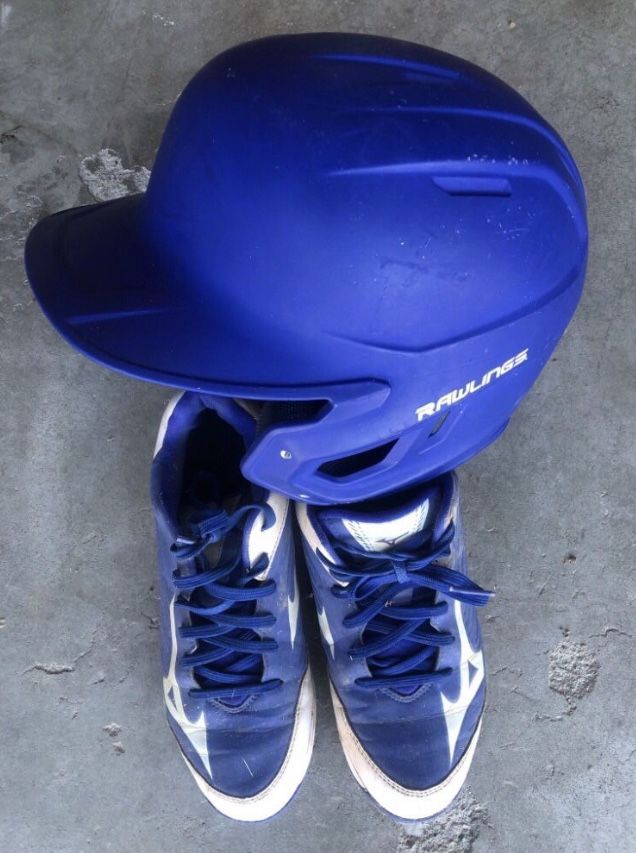 Rawlings batting helmet and molded cleats 7.5