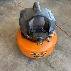 RIDGID
6 Gal. 150 PSI Portable Electric Oil-Free Jobsite Pancake Air Compressor with Dual Pressure Gauges and 2-Quick Couplers