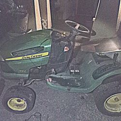 John Deere Ride Along Mower 