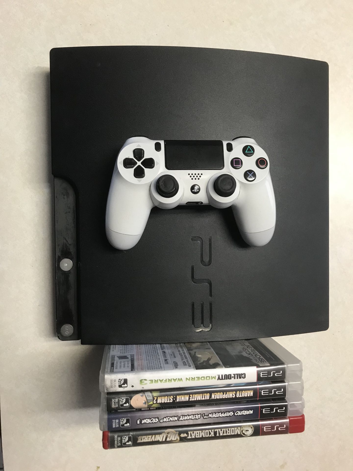 PS3 like new with new controller and games