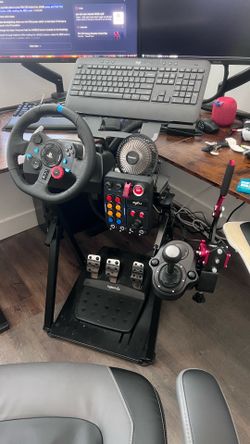 Logitech G29 racing sim setup with shifter and stand