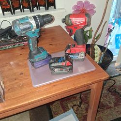Marital Drill And Milwaukee Impact With Two Battries 140.00 Cash 