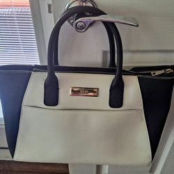 Lovely All Leather Black And White DKNY Bag With Shoulder Strap And Side Pocket