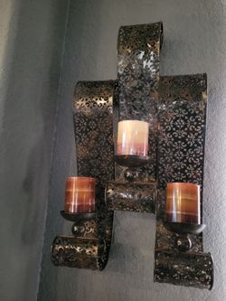Pair of metal wall candle holders