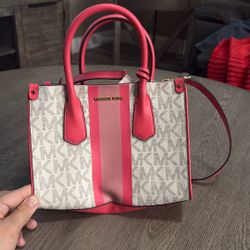 Pink and white michael kors bag