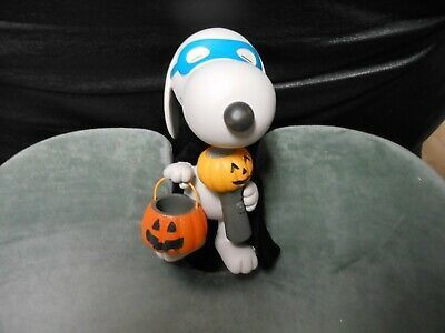 Hallmark Peanuts figurine features Snoopy wearing a Halloween costume.4.25" W x 6.5" H x 5.5" D