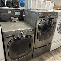 LG washer and dryer set electric mega capacity with one included pedestal