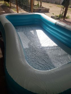 10 ft rectangle  swimming pool  n8ce and clean I ASK  $25.00 cash