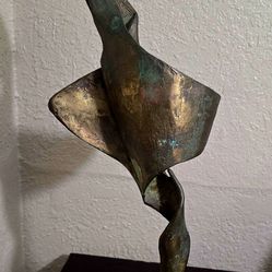 Bronze Statue on Stone Base
