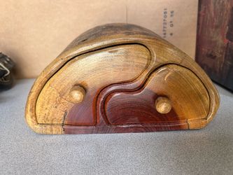 handcrafted wooden puzzle or secret compartment box