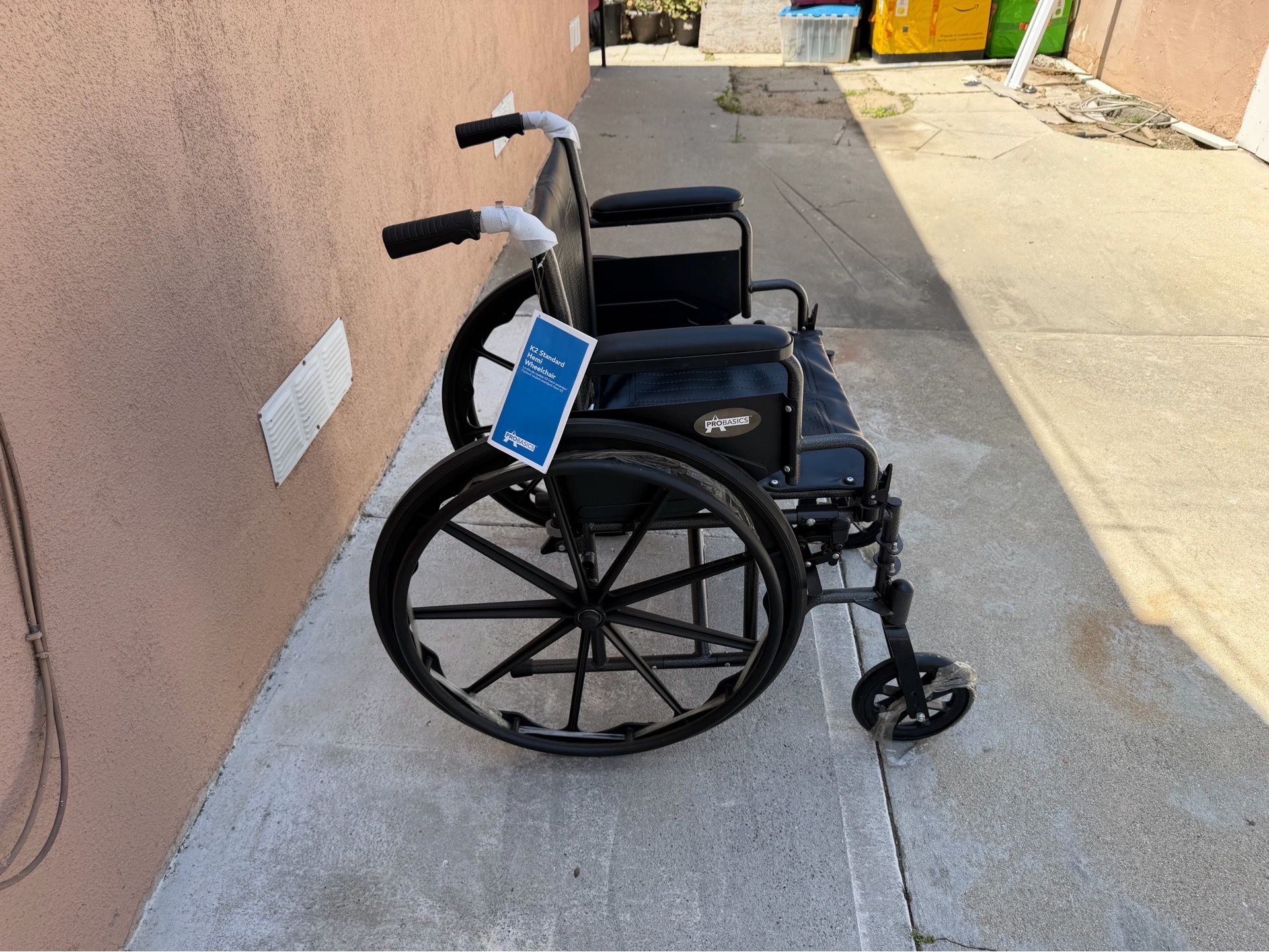 20 inches wide wheelchair in excellent condition with footrest easy to fold