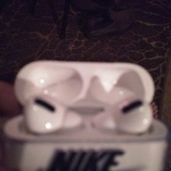 Brand New AIR PODS,. NIKE CHARGING CASE