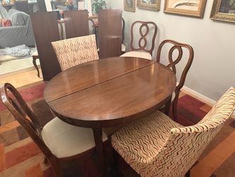 Antique Wood Oval Dining Table with 8 Chairs and matching Buffet