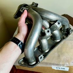 Toyota Corolla exhaust manifold - new, never installed! 