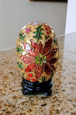 Cloisonne Egg With Poinsettia Holly Stars Gold Finish Background Wooden Base