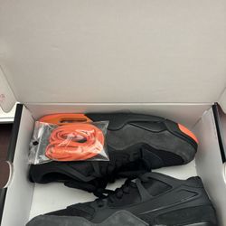 Size 13 Air Jordan 4 RM Gets Spooky in Black and Burnt Orange