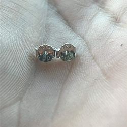 saphire earrings studded 925 sober with white saphire circled around saphire gem