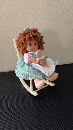 Doll in rocking chair