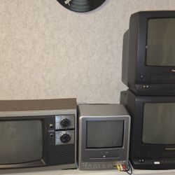 Four vintage CRT televisions.