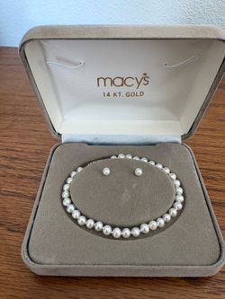 Macys 14k pearl bracelet and earrings set. New in box, never used.