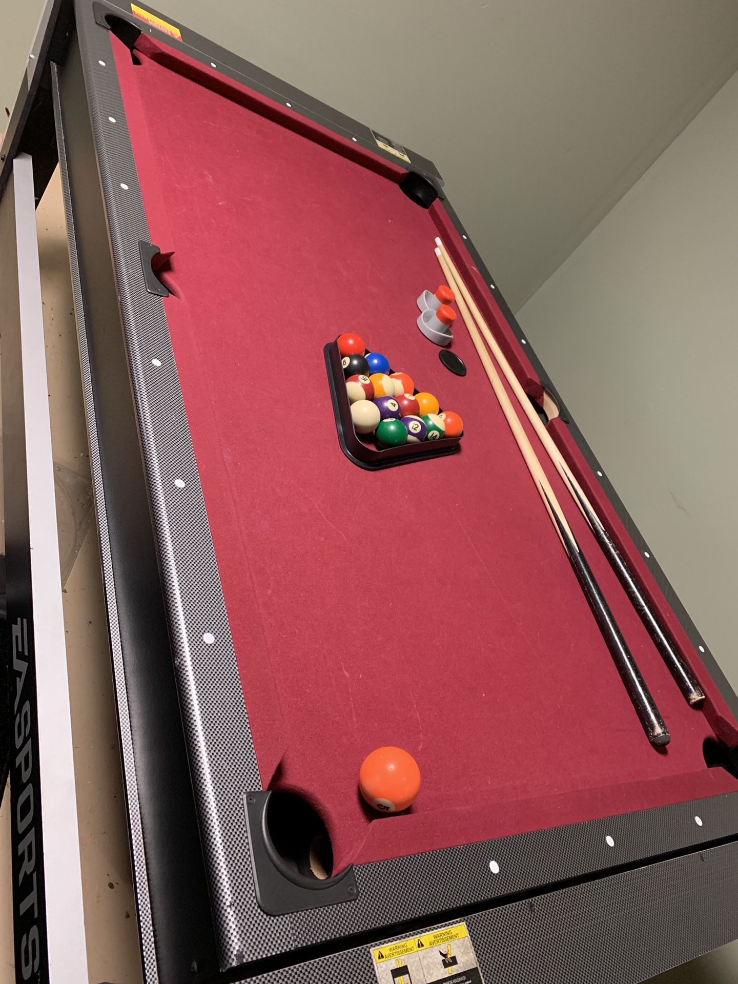 Pool table converts to air hockey