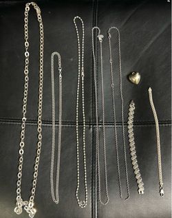 150 grams of .925 Sterling Silver Jewlery 5 chains 2 Bracelets 1 Heart Pendant ,,